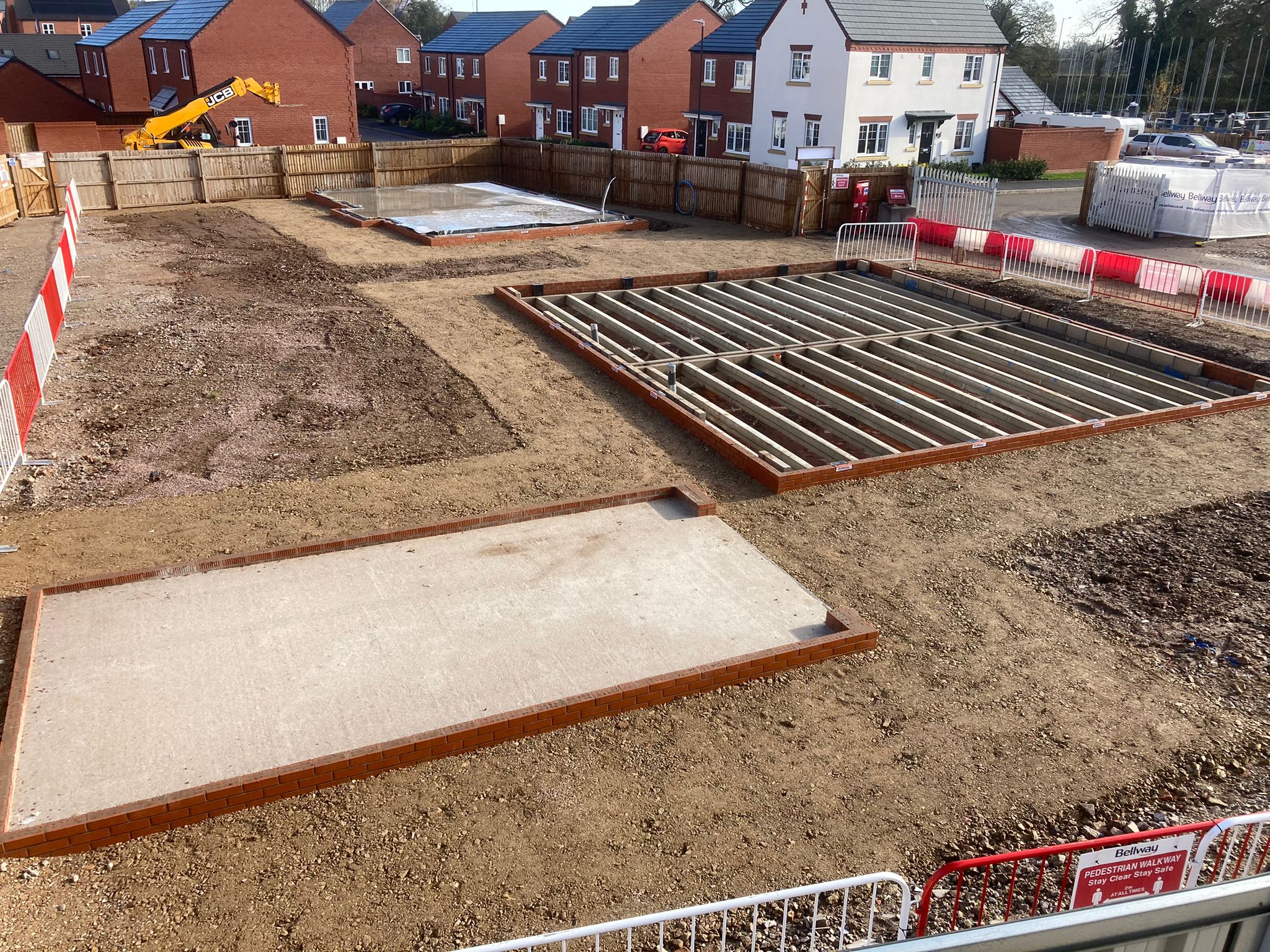Site photo showing foundations, complete and partial.